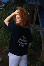 Load image into Gallery viewer, Ladies Hola, Bonjour, Namaste, Ciao  Navy T-Shirt